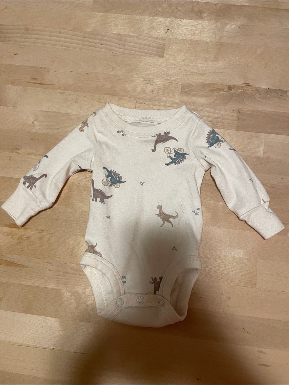Carter's Cream Long-Sleeve Bodysuit with Brown & Teal Dinosaur Print